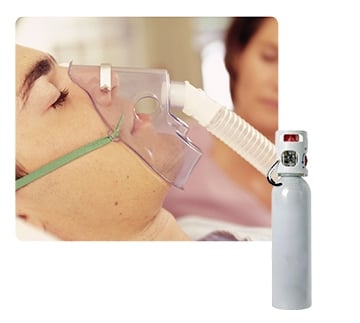 Un patient avec un masque d'oxygène